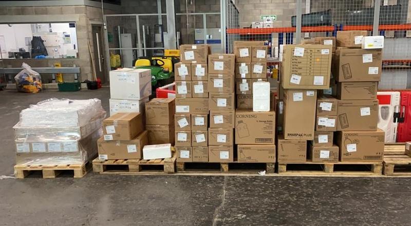 Photo of boxes of PPE in the Old Road Campus Distribution Centre