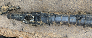 A cable joint after having failed explosively due to water ingress.